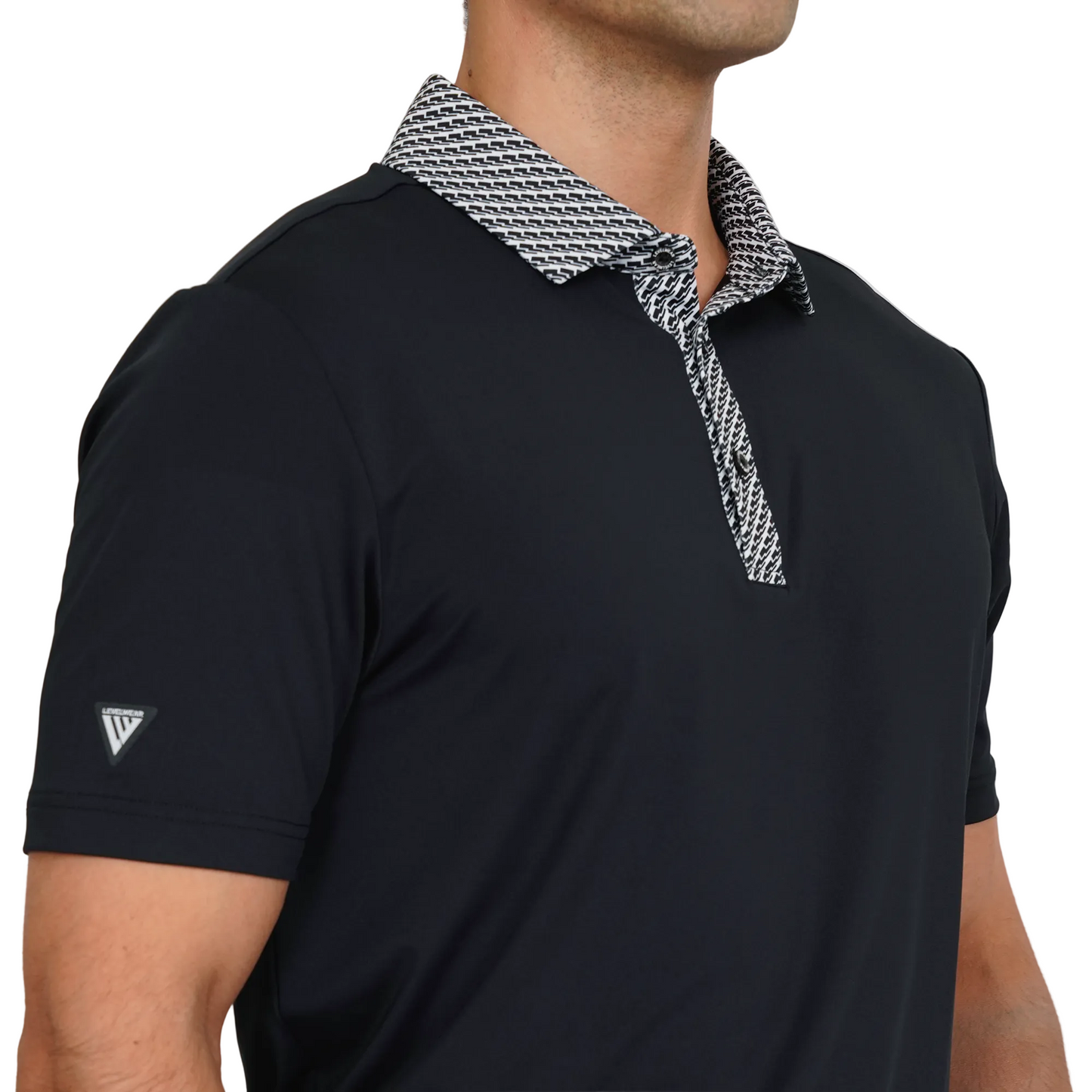 Black Levelwear polo shirt with patterned collar worn by a person on a plain background