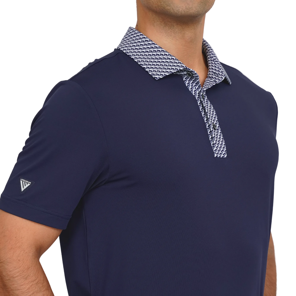 Navy Levelwear blue polo shirt with patterned collar on a plain background